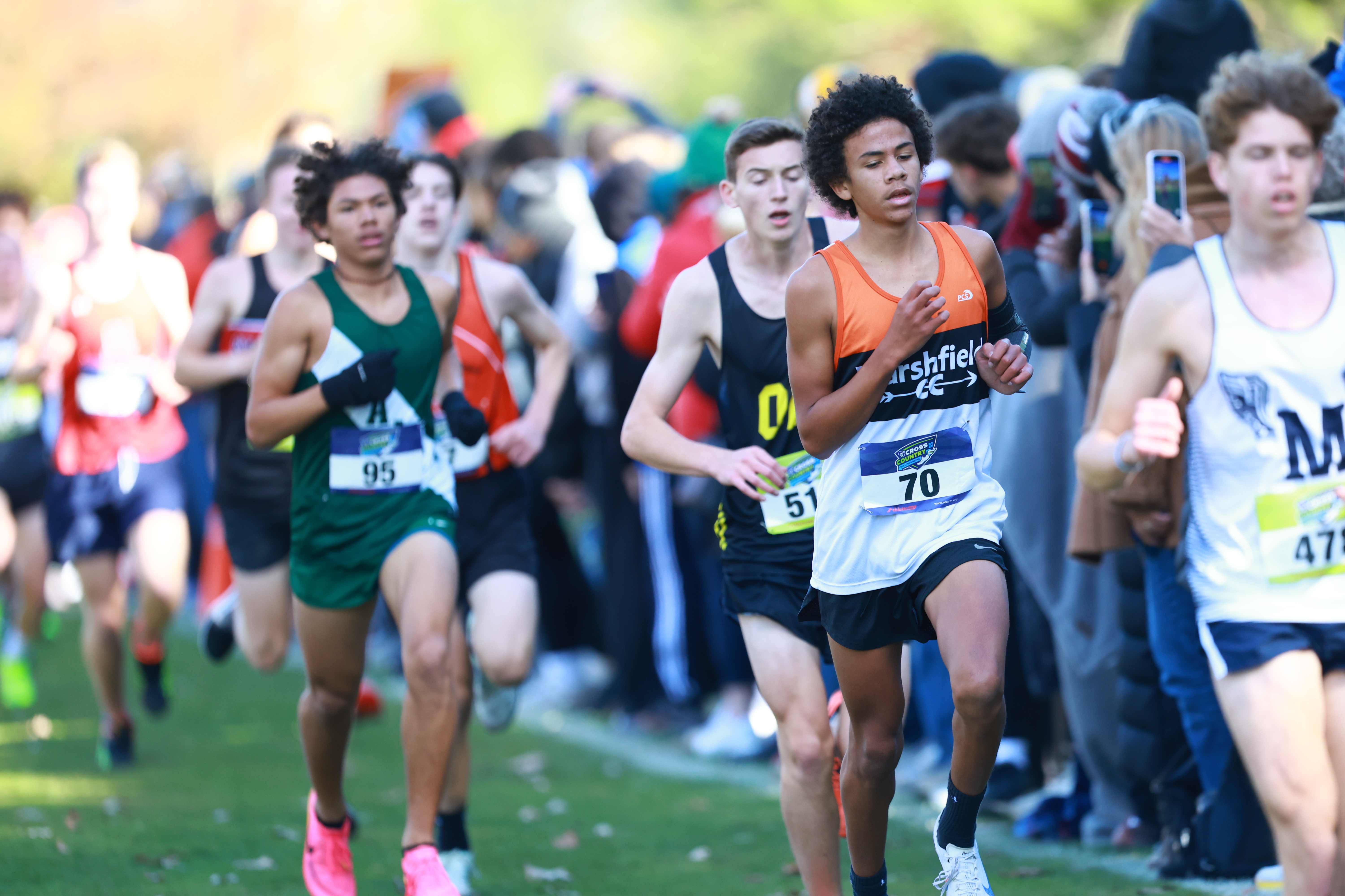 boys running in a cross country race