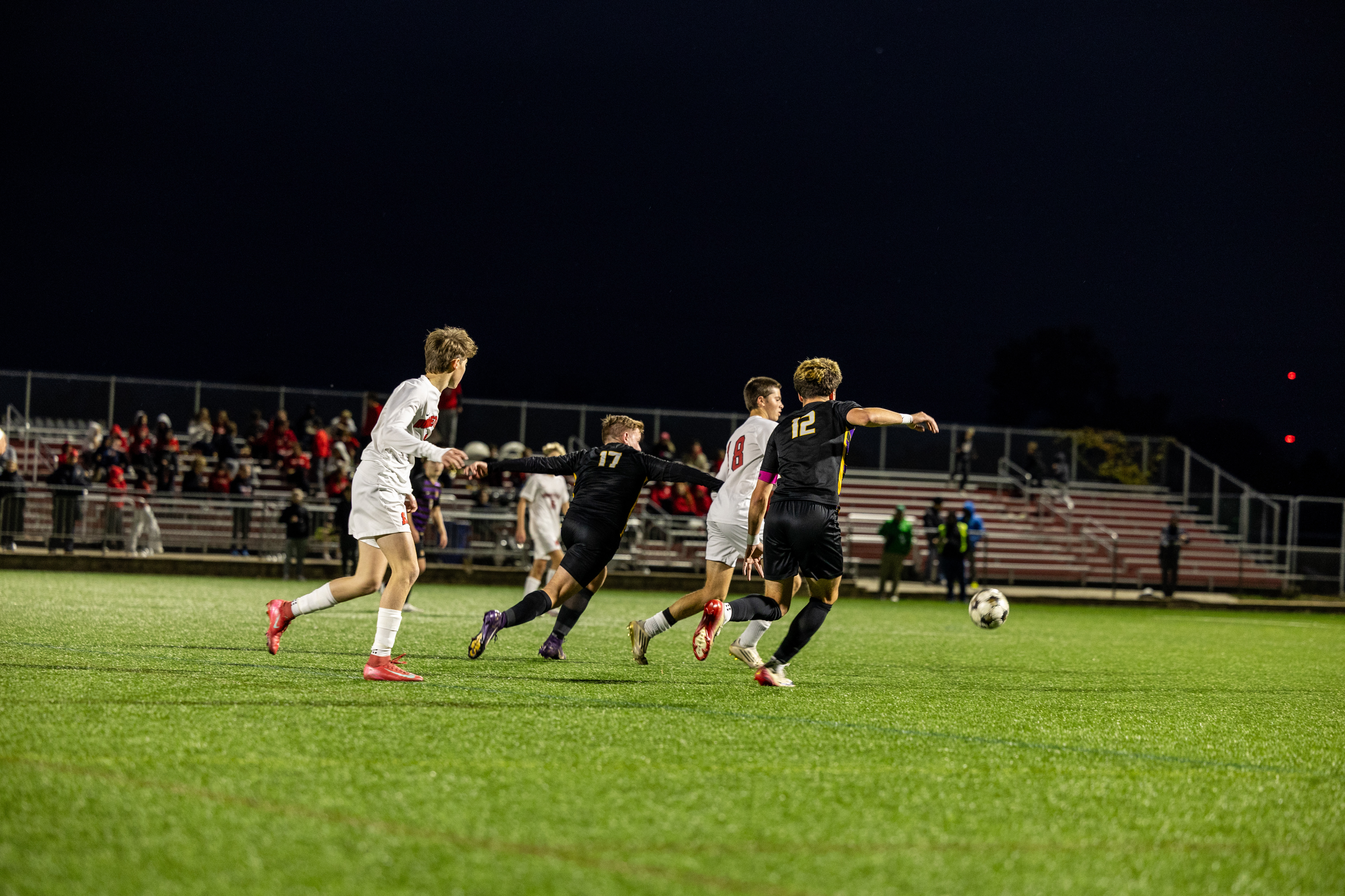 boys soccer players on the field at the state championship